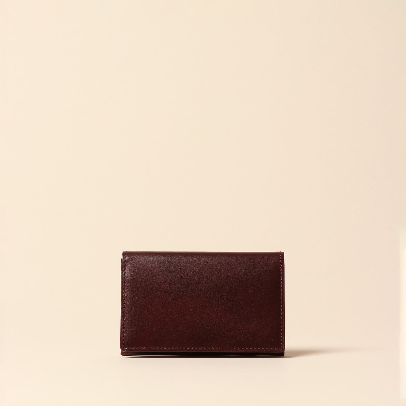 < CYPRIS > Business card holder in white Shirasagi leather, brown